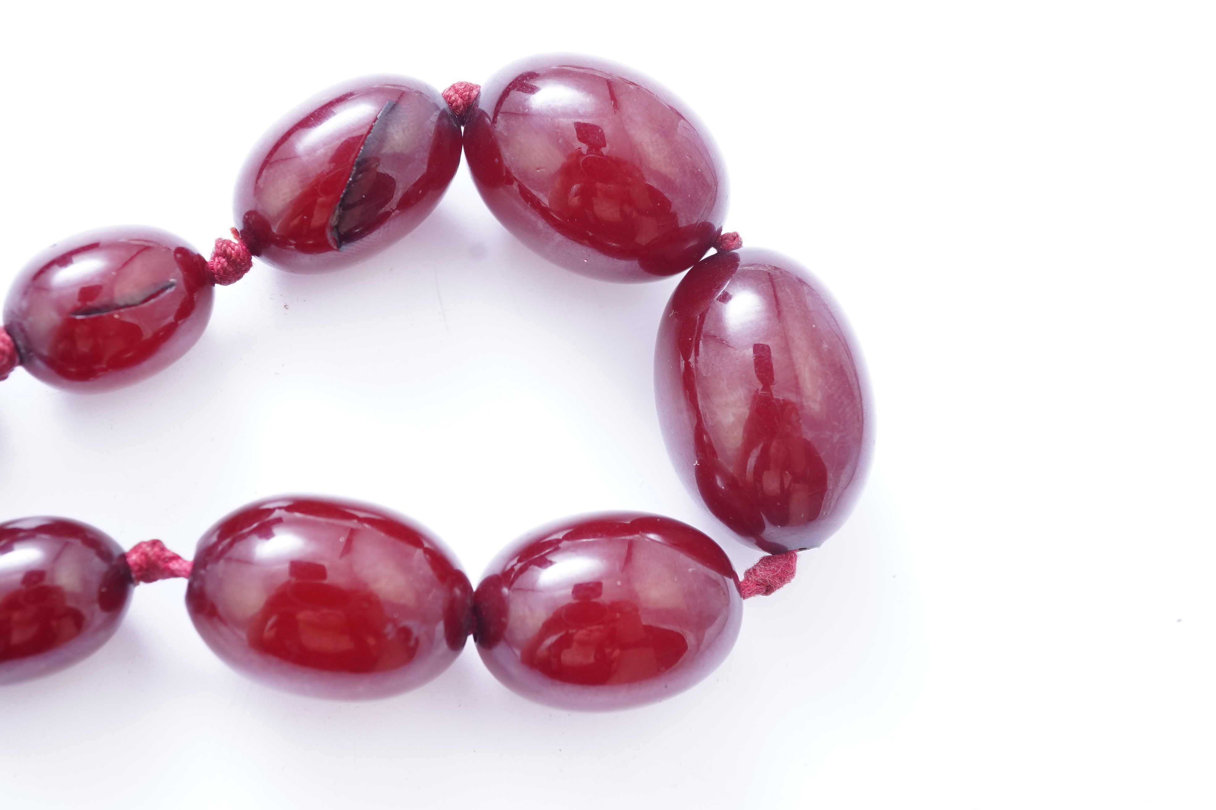 A cherry bakelite 'amber' necklace